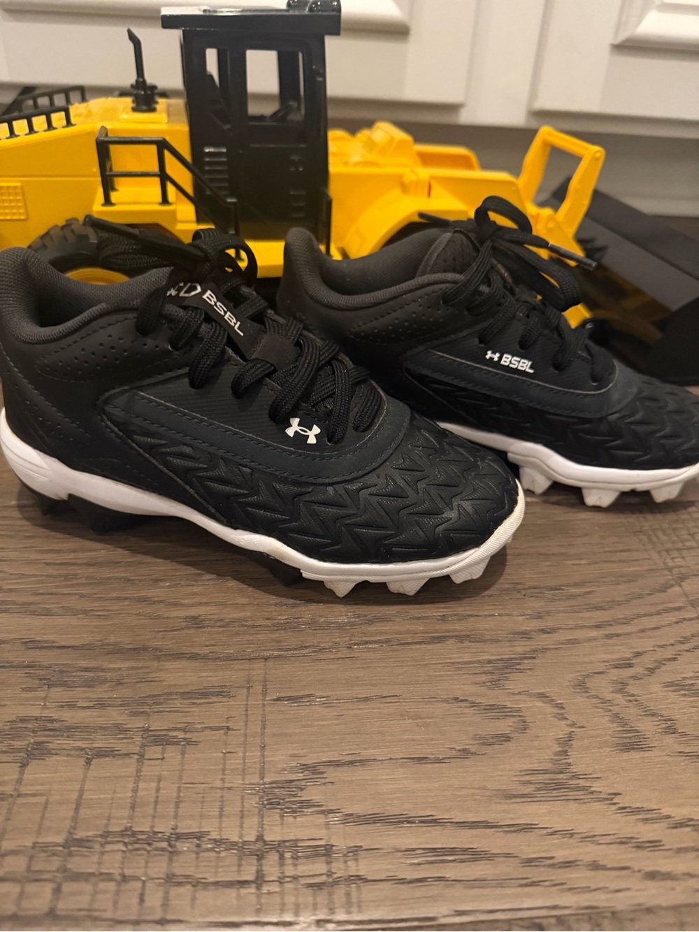 Under Armour Kids Black and White Turf Baseball Sneakers